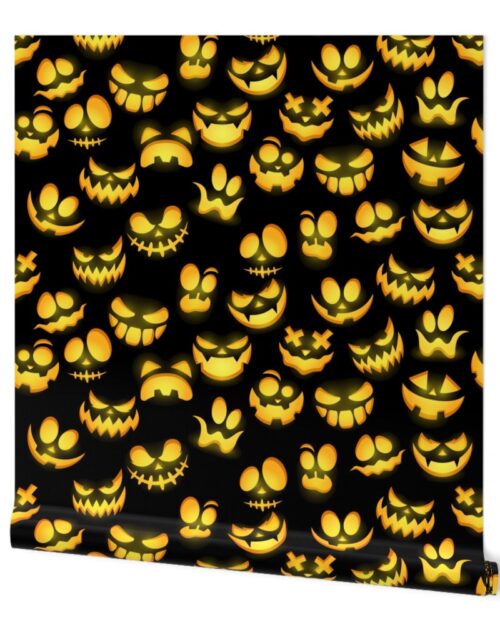 Grinning Halloween Jack o Lantern Faces in Orange on Black Wallpaper