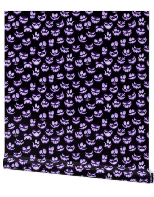 Mini Grinning Halloween Jack o Lantern Faces in Purple on Black Wallpaper