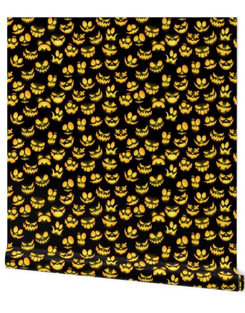 Mini Grinning Halloween Jack o Lantern Faces in Orange on Black Wallpaper