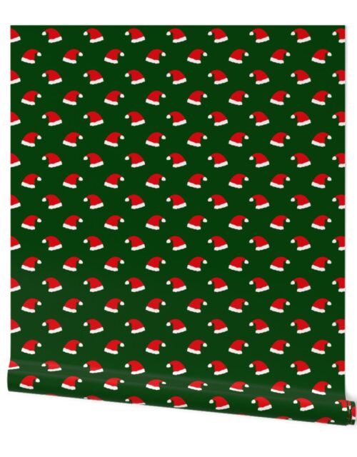 Small Jolly Old Saint Nick Red Santa Christmas Hats on Forest Green Wallpaper