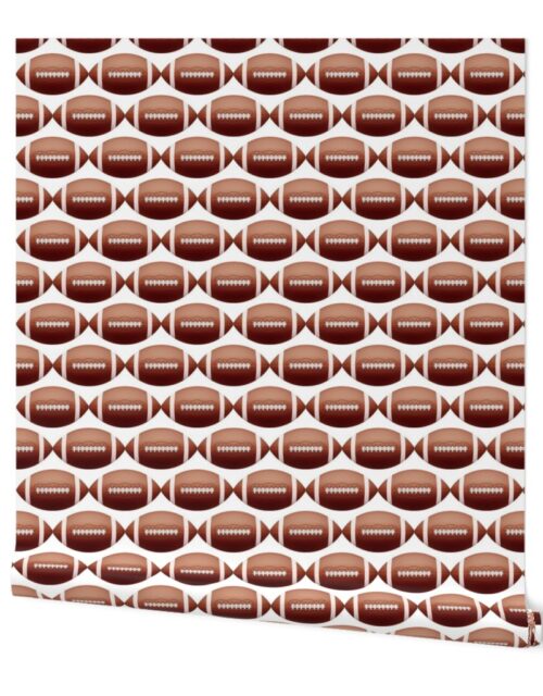 4 inch Gridiron American Pigskin Football with Lacing and Stitching on White Background Wallpaper