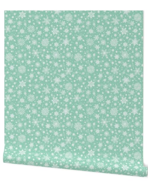 Small Merry Bright Mint Green  and White Splattered Snowflakes Wallpaper