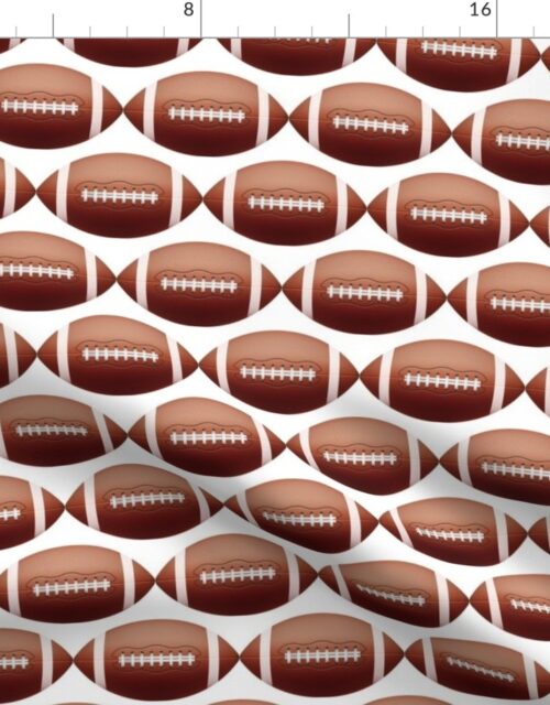 4 inch Gridiron American Pigskin Football with Lacing and Stitching on White Background Fabric