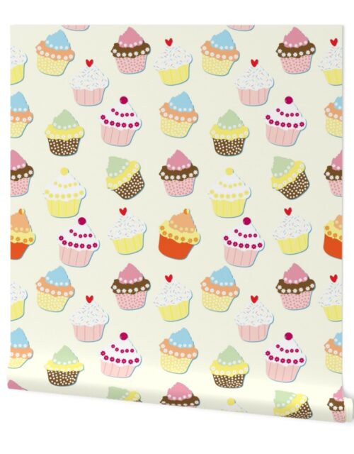 Cream Pastel Decorated and Iced Cupcakes Wallpaper