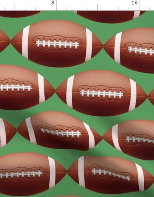 8 inch Gridiron American Pigskin Football with Lacing and Stitching on Field Green Fabric