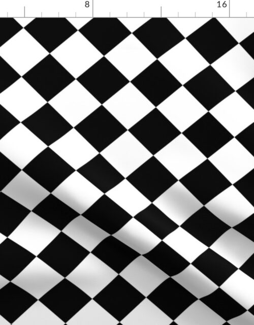 Black and alternating white 2″ diagonal diamond harlequin pattern to coordinate with black and white collection Fabric