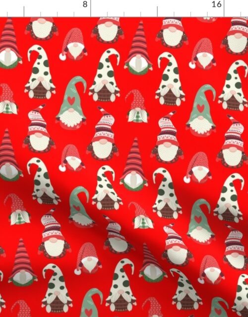 Christmas Gnomes in Holiday Green and Red Caps on Christmas Red Fabric