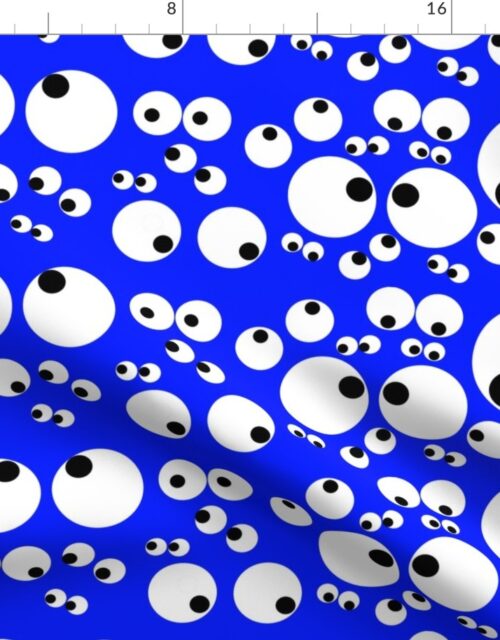 Googly Goo Goo Eyes on Electric Neon Blue Fabric