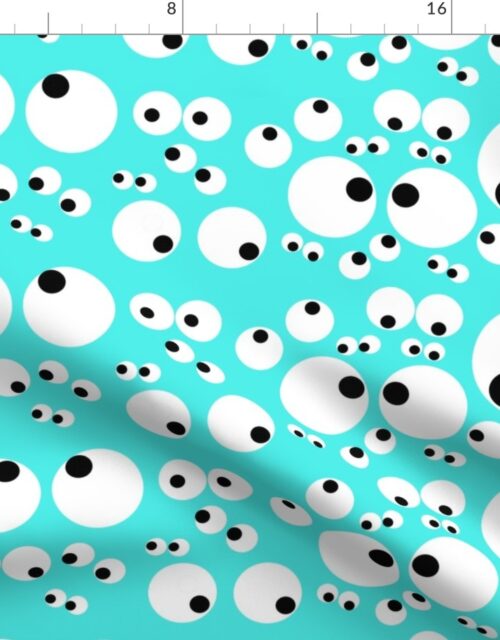 Googly Goo Goo Eyes on Neon Aqua Fabric