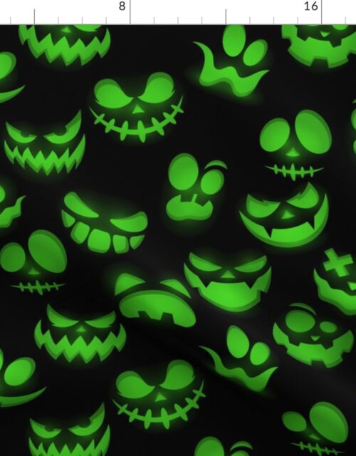 Grinning Halloween Jack o Lantern Faces in Neon Green on Black Fabric