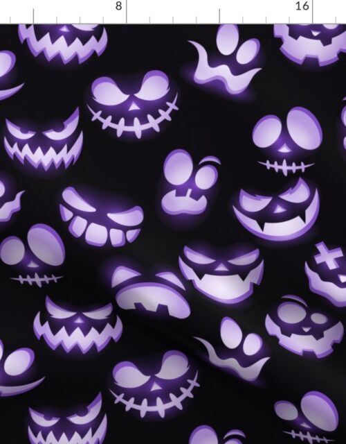 Grinning Halloween Jack o Lantern Faces in Purple on Black Fabric