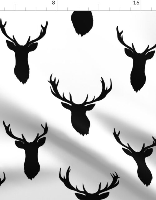 Large Black Buck Deer Trophy Heads with Antler Racks Mounted on White Fabric