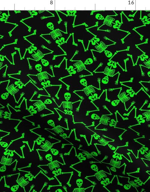 Small Bright Green Dancing Halloween Skeletons Scattered On Black Fabric