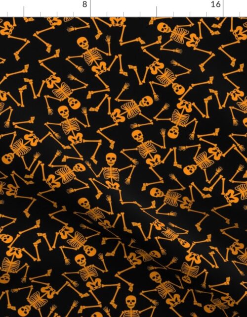 Small Bright Orange Dancing Halloween Skeletons Scattered On Black Fabric