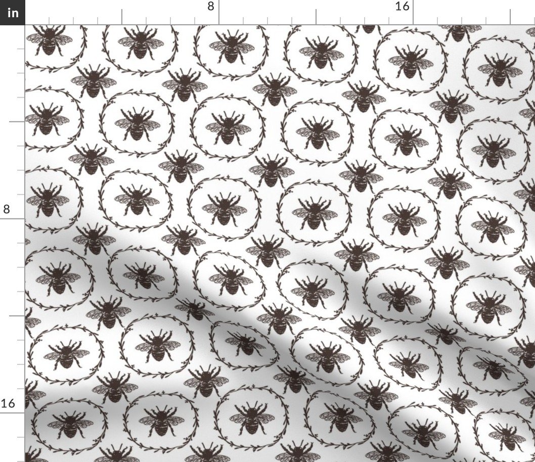 Small French Provincial Bees in Laurel Wreaths in Chocolate on White Fabric