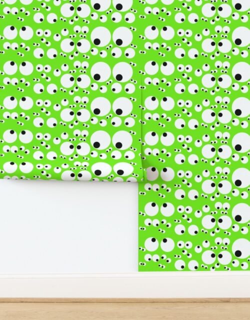 Googly Goo Goo Eyes on Neon Green Wallpaper