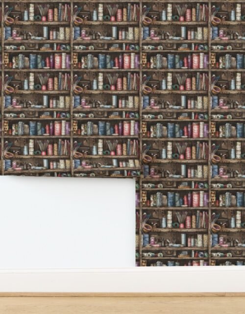 Vintage Bookcase Filled with Fabric Bobbins and Sewing Spools Wallpaper
