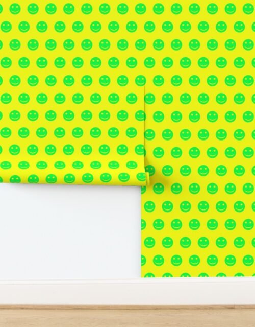 Neon Green Smiley Faces on Vivid Yellow Background Wallpaper