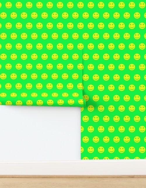 Neon Yellow Smiley Faces on Bright Green Background Wallpaper