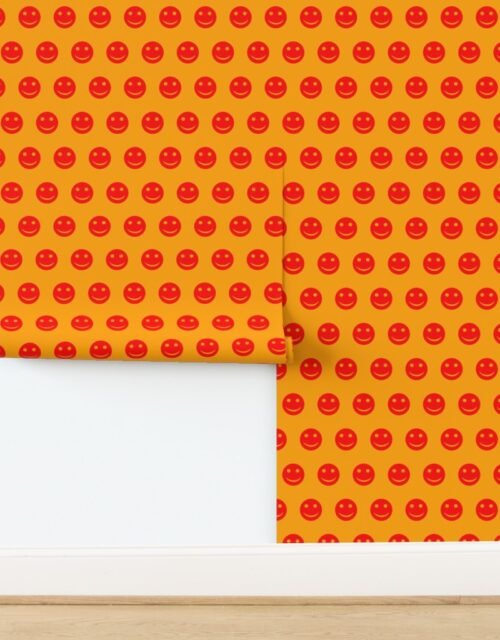 Red Smiley Faces on Vibrant Orange Background Wallpaper