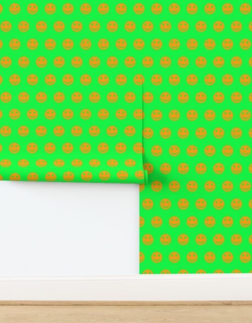 Orange Smiley Faces on Bright Green Background Wallpaper