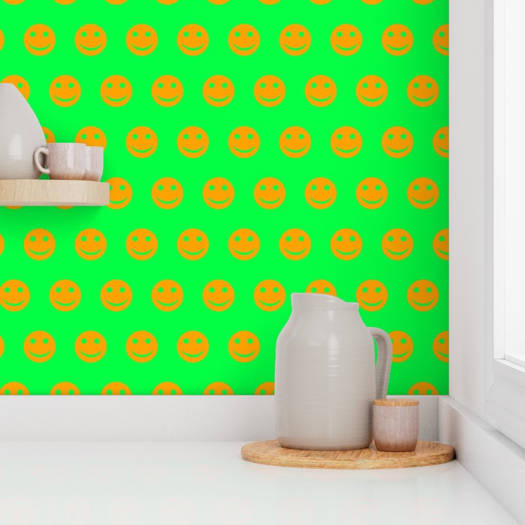 Orange Smiley Faces on Bright Green Background Wallpaper