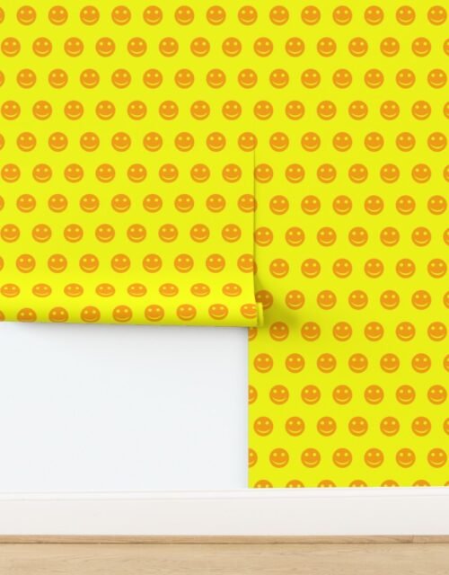 Orange Smiley Faces on Bright Yellow Background Wallpaper