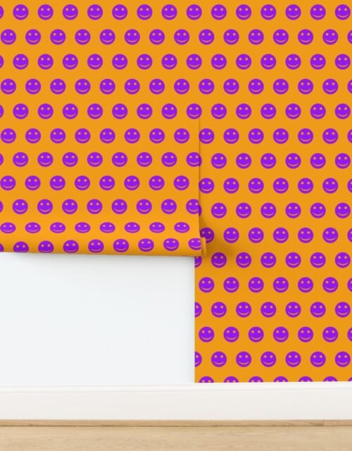 Purple Smiley Faces on Bright Orange Background Wallpaper