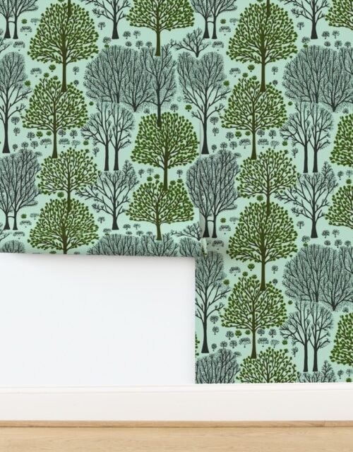 New England Endless Forest Trees in Forest Green and Winter Gray on Mint Wallpaper
