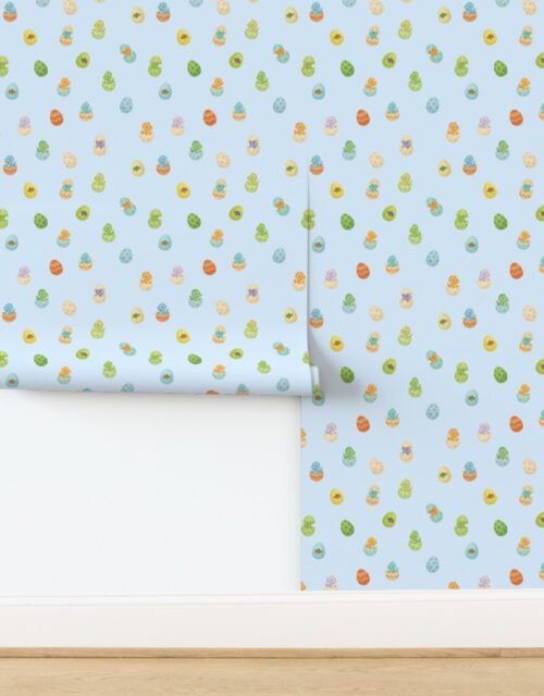 Easter Dino Eggs Watercolor Pattern on Soft Blue Wallpaper